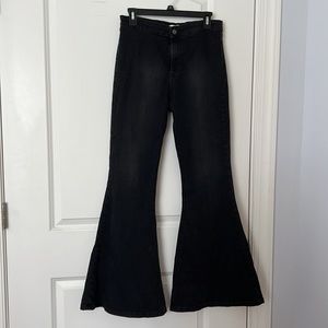 Brand new, never worn bell bottom jeans. Stretchy and high size.